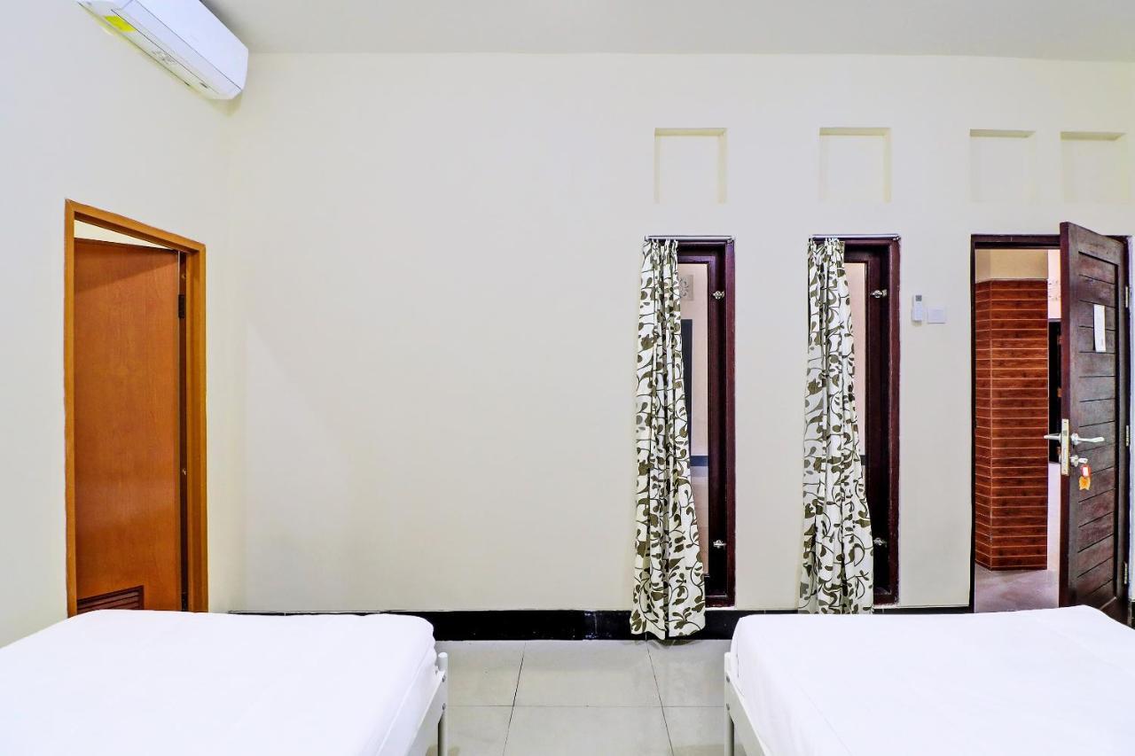 Oyo 91864 Holistic Stay Jimbaran Bagian luar foto