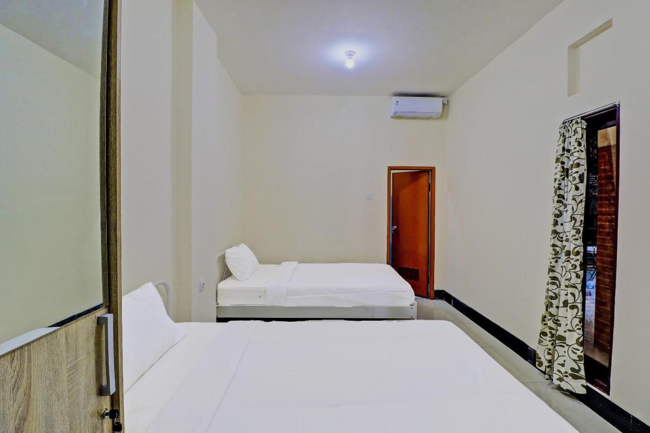Oyo 91864 Holistic Stay Jimbaran Bagian luar foto